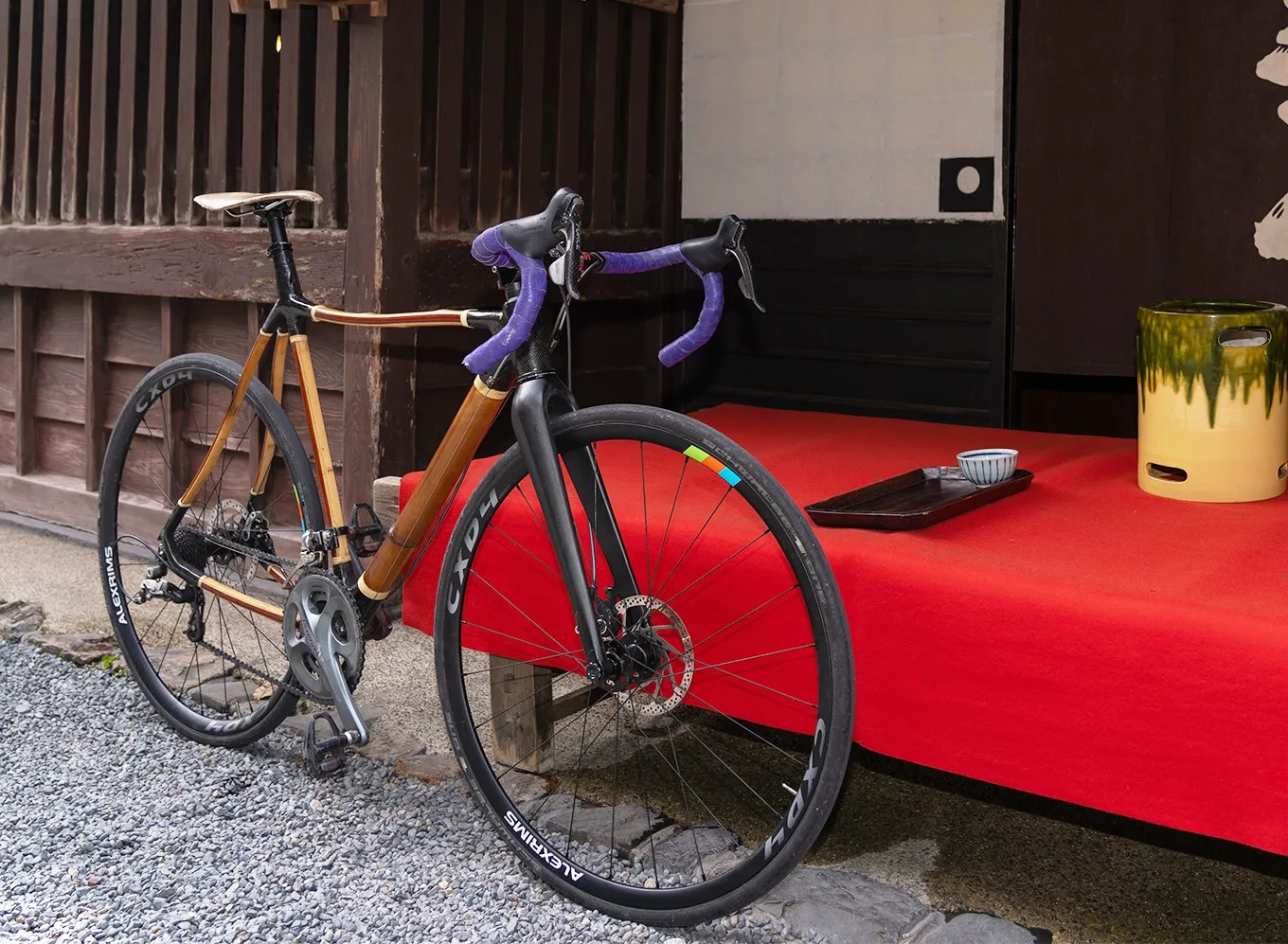 A Samuride in front of a japanese tea house.